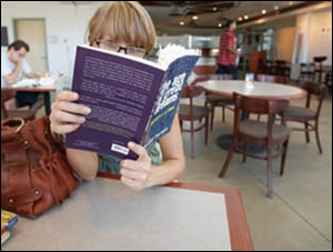 student reading in lied library