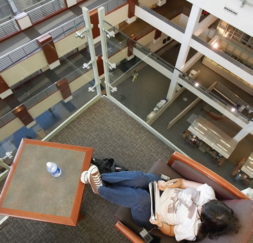student reading in lied library 2